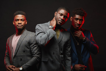 Positive african ethnicity businessmen, well-dressed business partners wearing stylish suits...