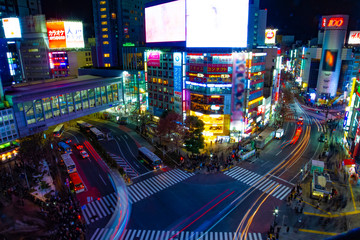 Night timelapse crossing at the neon town in Shibuya Tokyo high angle wide shot