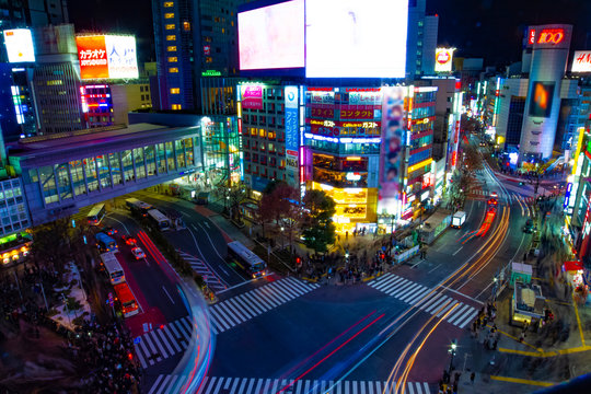 Night timelapse crossing at the neon town in Shibuya Tokyo high angle wide shot