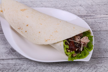 Tortilla with tuna, salad and dried tomato