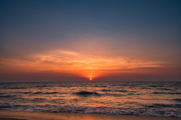 Fototapeta na wymiar beautiful moody sunset with sea in the foreground