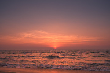 Fototapeta na wymiar beautiful moody sunset with sea in the foreground
