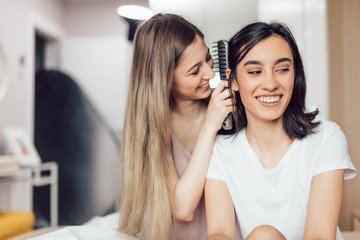 two positive girls having fun while taking care of themselves. close up photo.happiness, lifestyle