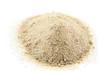 pile of sand on a white background