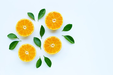 High vitamin C, Orange fruits with leaves on white background.