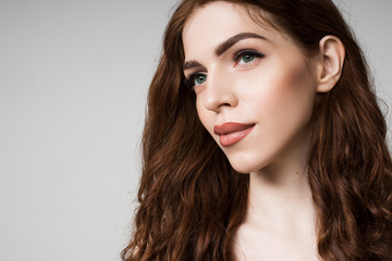 Fototapeta premium Closeup portrait of girl with lashes. Long beautiful eyelashes and perfect skin. Photo for beauty salon
