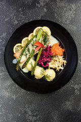 Grilled salmon with asparagus and potatoes, restaurant serving portion