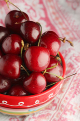 A bowl with ripe cherry