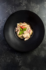 Italian penne pasta with cheese and basil