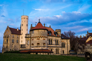 Fototapeta na wymiar Germany, Lichtenstein castle famous tourist destination in swabian jura nature region in magic afterglow light
