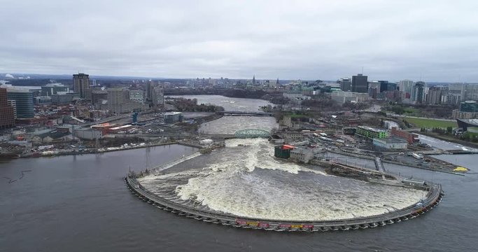 Drone footage above the Ottawa River right downtown during the 2019 Ottawa flood with the Chaudiere Bridge and Portage Bridge.