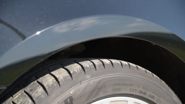 Air suspension of a black Audi A8 lowering the car