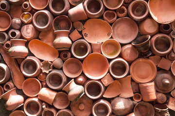 Group of pottery on the wall  background.
