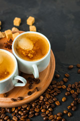 Obraz na płótnie Canvas coffee freshly brewed in a white cup serving of beverage (coffee grain). food. top.copy save