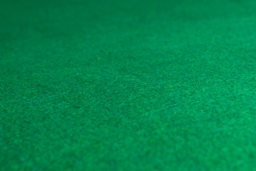Green poker table background. Green fabric background