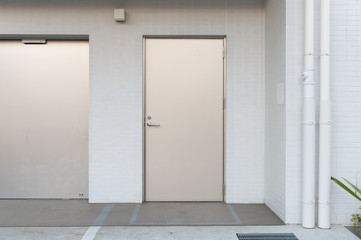 sidewalk by street wall & door