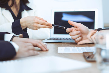 Business woman giving pen to businessman ready to sign contract. Success communication at meeting or negotiation