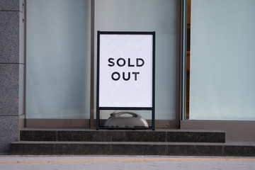 Sold out billboards placed in front of store boutiques