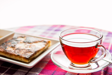 a cup of tea and roti on the table