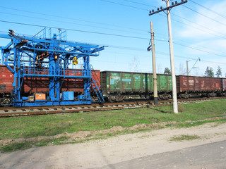 Fototapeta na wymiar repair crane om the railway the sun day