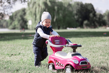 little boy on a walk in the Park on a spring day.