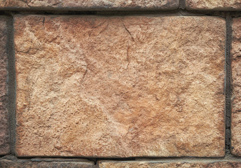 texture of the ancient natural stone brick.