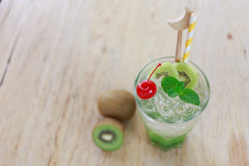 Kiwi water on the wooden floor.