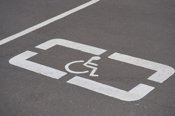 Disabled Road Sign on parking lot.