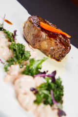 Beef sirloin with sweet potato mousse, curry sauerkraut and fresh thyme sauce