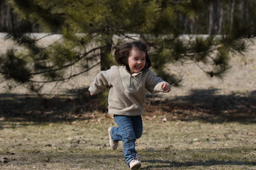 young girl running outdoor during summer