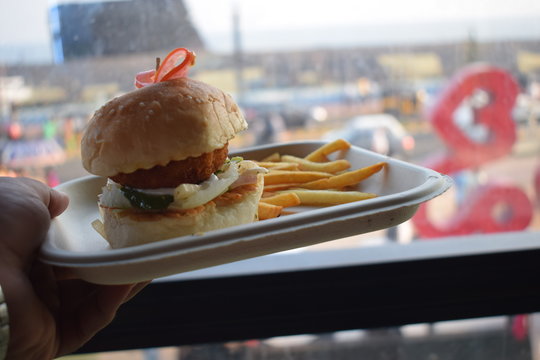 What Fun! Having A Burger While Looking At The Blue Sea And A Decommissioned Submarine!