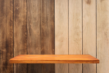 shelf at wooden background texture