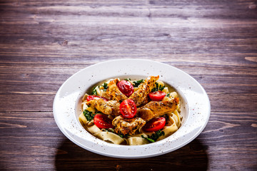 Pasta with meat, sauce and vegetables