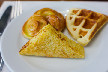 waffle with croissant and sandwich