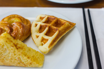 waffle with croissant and sandwich