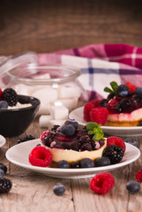 Cheesecakes with mixed berries.