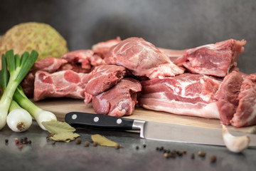 Detail from kitchen - pork, vegetable, spice and knife