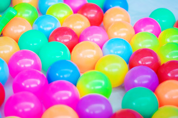 Fototapeta na wymiar background on small plastic balls in pool