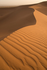 Desert  landscape with a little tourist  silhouette