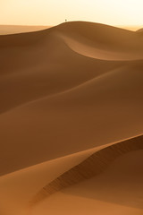 Desert  landscape with a little man silhouette