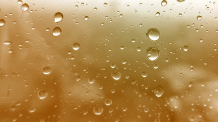 Water droplets texture on brown background