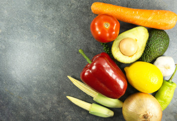Many vegetables on stone background. Top view, Copy space for design. .