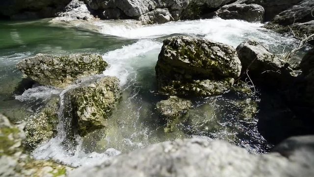 The Astico river in Arsiero. Water movement between the rocks