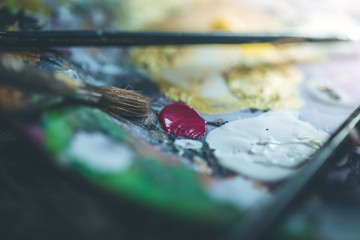 Painting artwork: paint brushes on painting background