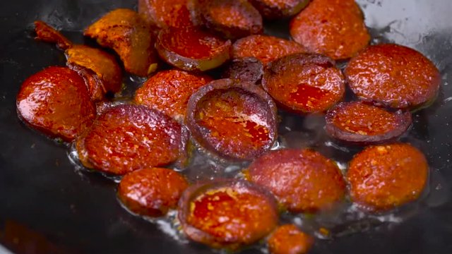Turkish Sausage (Sucuk) in Frying Pan for Breakfast. close up shot
