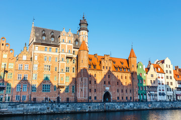Fototapeta premium Sunny day at embankment of Motlawa river in historical part of Gdansk, Poland