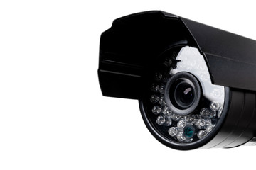 CCTV security camera video equipment. Surveillance monitoring. Video camera lens closeup. Macro shot. Security concept. Security camera isolated on white background
