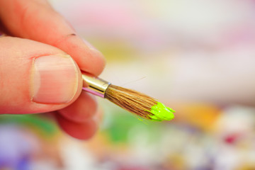 Painting artwork: paint brushes on painting background