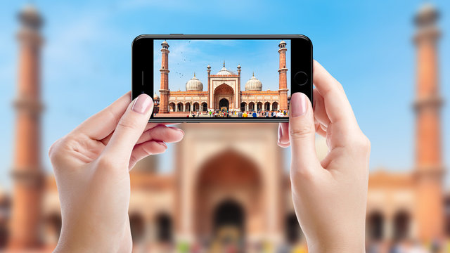 Taking a photo with mobil phone of Jama Masjid Mosque, Top sights of New Delhi, India