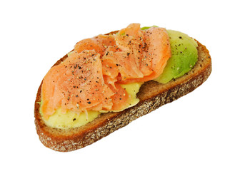 Sandwich with avocado and red fish on a white background. Close-up